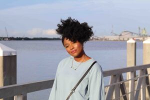 Sister Frennn - Cierra Danielle Kinston posing on a bridge- The Best Way To Move On Blog